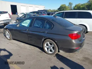 2014 BMW 3 Series 328d xDrive with VIN WBA3D5C58EKX97290, listed as a IAAI auction lot 40453599 with Not Provided miles. Bid and sale history available at carsss.com. Image 3.