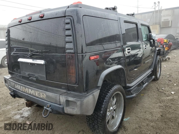 2003 Hummer H2 with VIN 5GRGN23U83H143843, listed as a Copart auction lot 43792915 with 115,569 mi miles and Salvage Title. Bid and sale history available at carsss.com. Image 3.