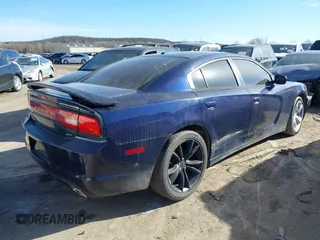 2014 Dodge Charger SXT with VIN 2C3CDXHGXEH148806, listed as a IAAI auction lot 41710035 with 210,296 mi miles and . Bid and sale history available at carsss.com. Image 4.