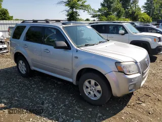 2008 Mercury Mariner с VIN 4M2CU81128KJ48913, выставлен на аукционе Copart как лот 61588355 с пробегом 84 883 миль миль и Списание • Salvage title. История ставок и продаж доступна на DreamBid. Изображение 4.