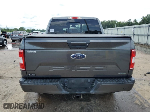 2018 Ford F-150 XL with VIN 1FTEW1EG7JFC40015, listed as a Copart auction lot 60659755 with 194,645 mi miles and Salvage title. Bid and sale history available at DreamBid. Image 6.