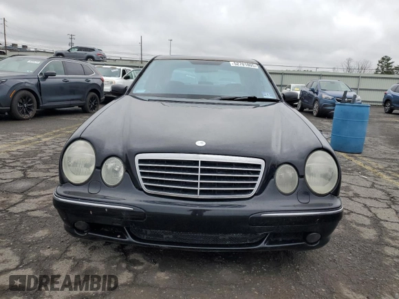 2002 Mercedes-Benz E with VIN WDBJF74J22B408004, listed as a Copart auction lot 52701805 with 240,246 mi miles and Clean Title. Bid and sale history available at DreamBid. Image 5.