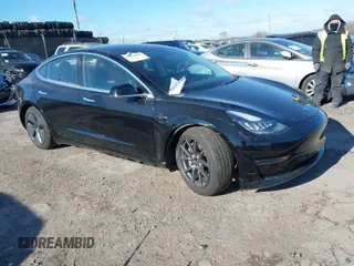 2020 Tesla Model 3 Long Range with VIN 5YJ3E1EB0LF800740, listed as a IAAI auction lot 41628876 with 52,130 mi miles. Bid and sale history available at carsss.com. Image 1.