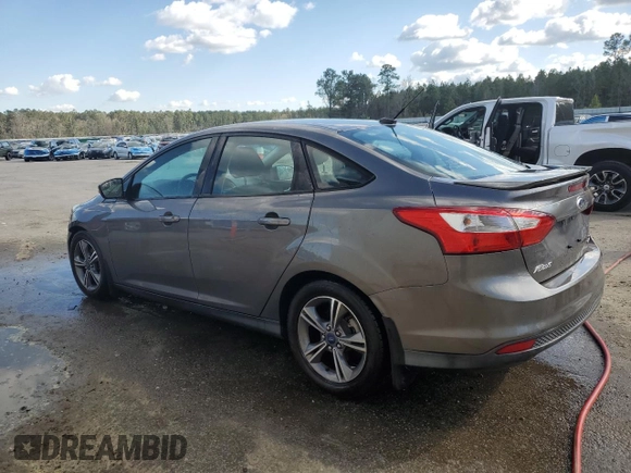 2014 Ford Focus SE with VIN 1FADP3F21EL244324, listed as a Copart auction lot 48793795 with 69,809 mi miles and Salvage Title. Bid and sale history available at carsss.com. Image 2.