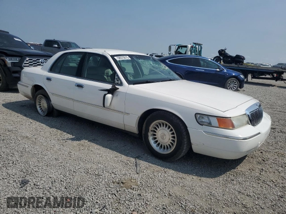 2002 Mercury Grand Marquis LS Premium z VIN 2MEFM75W52X666147, wystawiony jako Copart lot #58970815 z przebiegiem 133 495 mil mil oraz Szkoda całkowita • Salvage title. Historia ofert i sprzedaży dostępna na DreamBid. Obrazek 4.