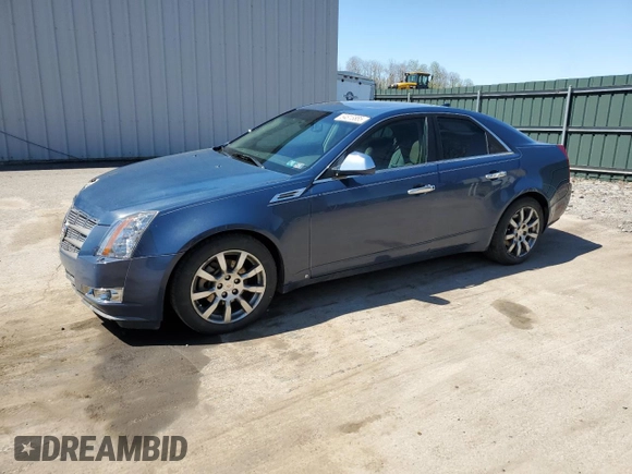 2009 Cadillac CTS AWD with VIN 1G6DH577390123365, listed as a Copart auction lot 54815885 with 141,026 mi miles and Salvage Title. Bid and sale history available at DreamBid. Image 1.