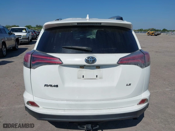 2017 Toyota RAV4 LE with VIN JTMZFREV7HJ143483, listed as a IAAI auction lot 41804683 with 129,319 mi miles. Bid and sale history available at carsss.com. Image 16.