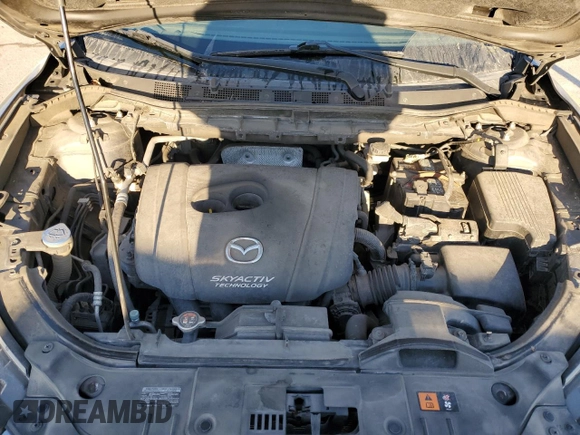 2015 Mazda CX-5 Touring with VIN JM3KE2CY0F0439125, listed as a Copart auction lot 43324945 with 210,404 mi miles and Clean Title. Bid and sale history available at DreamBid. Image 12.