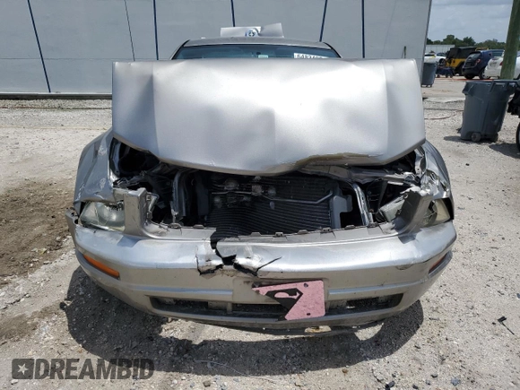 2008 Ford Mustang Deluxe with VIN 1ZVHT80N785206285, listed as a Copart auction lot 64834904 with 129,144 mi miles and Salvage Title. Bid and sale history available at carsss.com. Image 5.