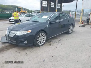 2010 Lincoln MKS w/EcoBoost with VIN 1LNHL9FT2AG614049, listed as a IAAI auction lot 42123376 with 119,276 mi miles. Bid and sale history available at carsss.com. Image 2.