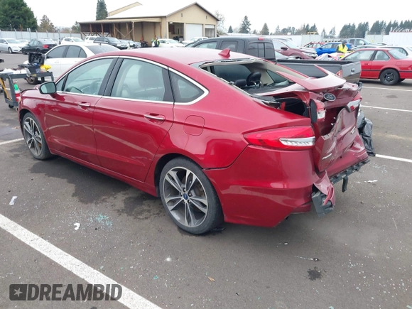 2019 Ford Fusion Titanium with VIN 3FA6P0K98KR179513, listed as a IAAI auction lot 41820059 with 112,155 mi miles. Bid and sale history available at carsss.com. Image 3.