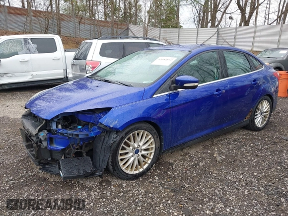 2014 Ford Focus Titanium with VIN 1FADP3J28EL240911, listed as a IAAI auction lot 42082812 with 144,625 mi miles. Bid and sale history available at carsss.com. Image 2.