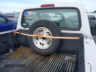 1995 Ford Ranger Splash z VIN 1FTCR10A0SUA16583, wystawiony jako IAAI lot #41495851 z przebiegiem 152 564 mil mil oraz . Historia ofert i sprzedaży dostępna na DreamBid. Obrazek 12.