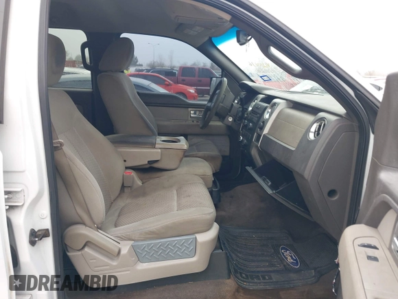 2009 Ford F-150 XL with VIN 1FTPW14V89FB30515, listed as a IAAI auction lot 41210636 with 220,187 mi miles. Bid and sale history available at carsss.com. Image 5.