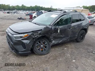2022 Toyota RAV4 Hybrid SE with VIN 2T3T6RFV6NW036068, listed as a IAAI auction lot 42344831 with 44,801 mi miles and . Bid and sale history available at DreamBid. Image 2.