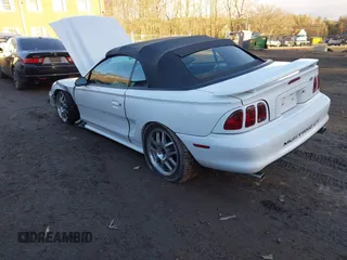 1996 Ford Mustang GT with VIN 1FALP45X7TF201553, listed as a IAAI auction lot 41487690 with 102,015 mi miles. Bid and sale history available at carsss.com. Image 3.