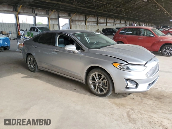 2020 Ford Fusion Titanium with VIN 3FA6P0RU5LR141507, listed as a Copart auction lot 64798205 with 113,216 mi miles and Salvage title. Bid and sale history available at DreamBid. Image 4.