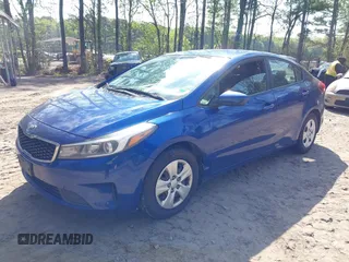 2017 Kia Forte LX with VIN 3KPFK4A70HE052223, listed as a IAAI auction lot 42036382 with 136,671 mi miles. Bid and sale history available at carsss.com. Image 17.