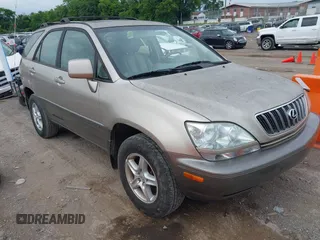 2001 Lexus RX 300 z VIN JTJHF10U810183964, wystawiony jako IAAI lot #42512239 z przebiegiem 155 209 mil mil oraz . Historia ofert i sprzedaży dostępna na DreamBid. Obrazek 1.