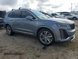 2021 Cadillac XT6 Premium Luxury with VIN 1GYKPCRS5MZ198953, listed as a Copart auction lot 67291154 with 0 mi miles and Salvage Title. Bid and sale history available at carsss.com. Image 4.