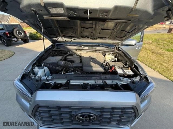 2022 Toyota Tacoma 4WD SR with VIN 3TMCZ5AN7NM463915, listed as a Copart auction lot 54006185 with 38,118 mi miles and Clean Title. Bid and sale history available at carsss.com. Image 7.
