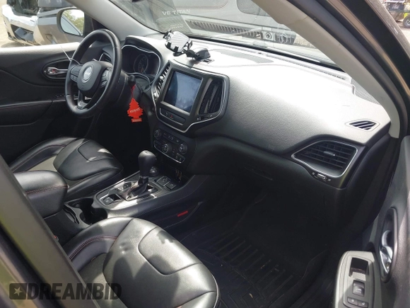 2019 Jeep Cherokee Trailhawk with VIN 1C4PJMBX2KD231734, listed as a IAAI auction lot 42235469 with 104,565 mi miles and . Bid and sale history available at DreamBid. Image 5.
