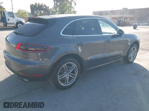 2015 Porsche Macan S with VIN WP1AB2A53FLB54910, listed as a IAAI auction lot 41990015 with 95,038 mi miles and . Bid and sale history available at DreamBid. Image 4.