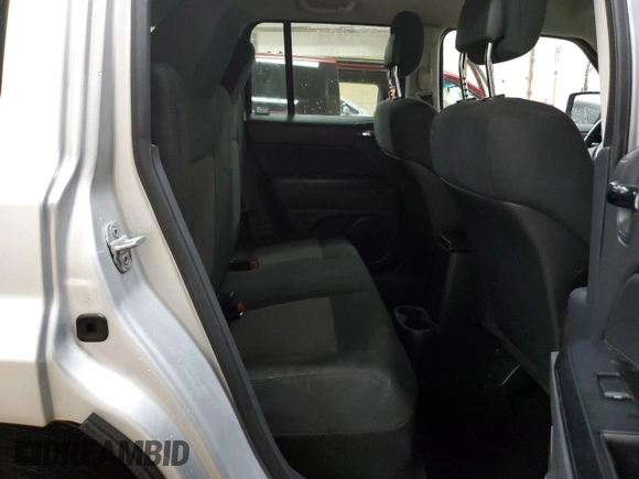 2012 Jeep Patriot with VIN 1C4NJPAB5CD558435, listed as a Copart auction lot 69703064 with 218,420 mi miles and Clean title. Bid and sale history available at DreamBid. Image 11.