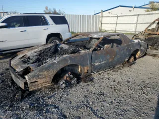 1985 Pontiac Firebird Trans Am with VIN 1G2FW87H5FN233441, listed as a Copart auction lot 77584954 with 0 mi miles and Salvage Title. Bid and sale history available at carsss.com. Image 1.
