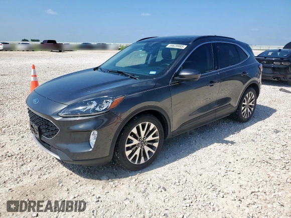 2020 Ford Escape Titanium Hybrid z VIN 1FMCU0DZ1LUC38345, wystawiony jako Copart lot #59628985 z przebiegiem 86 917 mil mil oraz Szkoda całkowita • Salvage title. Historia ofert i sprzedaży dostępna na DreamBid. Obrazek 1.