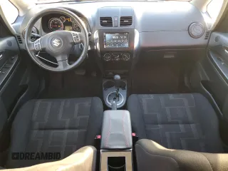 2012 Suzuki SX4 LE with VIN JS2YC5A38C6300439, listed as a Copart auction lot 85121124 with 74,324 mi miles and Clean Title. Bid and sale history available at carsss.com. Image 8.