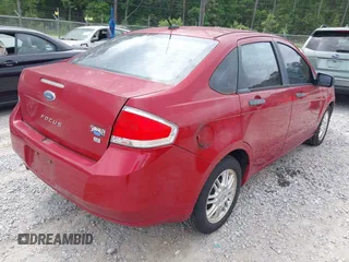 2011 Ford Focus SE with VIN 1FAHP3FN7BW189853, listed as a IAAI auction lot 42121843 with 98,921 mi miles. Bid and sale history available at carsss.com. Image 4.