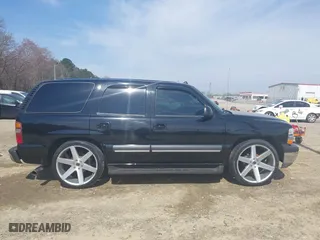 2003 Chevrolet Tahoe LT with VIN 1GNEC13Z73J322783, listed as a IAAI auction lot 41773868 with 259,710 mi miles. Bid and sale history available at carsss.com. Image 14.