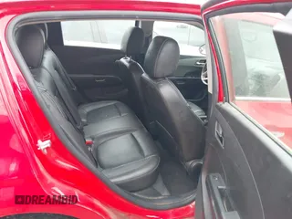 2015 Chevrolet Sonic LTZ z VIN 1G1JE6SB7F4198089, wystawiony jako IAAI lot #41150037 z przebiegiem 123 568 mil mil oraz . Historia ofert i sprzedaży dostępna na DreamBid. Obrazek 8.