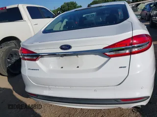 2018 Ford Fusion SE with VIN 3FA6P0H70JR250014, listed as a IAAI auction lot 41990580 with 121,628 mi miles. Bid and sale history available at carsss.com. Image 16.