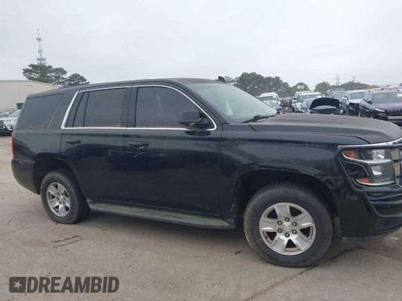 2017 Chevrolet Tahoe Commercial with VIN 1GNLCDECXHR304319, listed as a IAAI auction lot 41924011 with 130,566 mi miles and . Bid and sale history available at DreamBid. Image 13.
