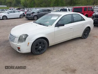 2007 Cadillac CTS with VIN 1G6DP577670104082, listed as a IAAI auction lot 42061316 with 140,965 mi miles. Bid and sale history available at carsss.com. Image 2.