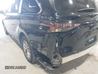 2023 Toyota Sienna XLE z VIN 5TDYRKEC5PS148076, wystawiony jako IAAI lot #42154673 z przebiegiem 169 197 mil mil oraz . Historia ofert i sprzedaży dostępna na DreamBid. Obrazek 17.