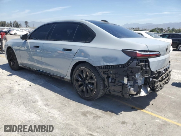 2023 BMW 7 Series 740i with VIN WBA23EH05PCM61539, listed as a Copart auction lot 58013225 with 16,242 mi miles and Salvage title. Bid and sale history available at DreamBid. Image 2.