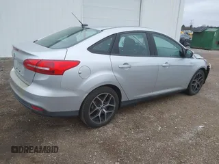 2017 Ford Focus SEL with VIN 1FADP3H20HL209209, listed as a IAAI auction lot 41921883 with 155,611 mi miles. Bid and sale history available at carsss.com. Image 4.