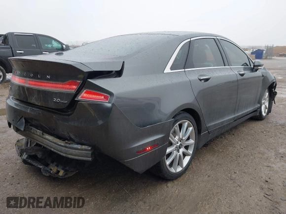 2015 Lincoln MKZ z VIN 3LN6L2G99FR604894, wystawiony jako IAAI lot #41433264 z przebiegiem 262 472 mil mil oraz . Historia ofert i sprzedaży dostępna na DreamBid. Obrazek 4.