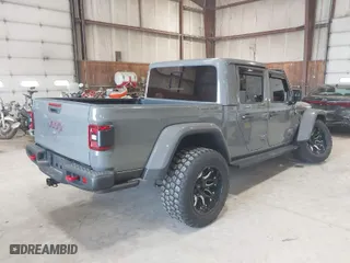 2020 Jeep Gladiator Rubicon with VIN 1C6JJTBG1LL214681, listed as a IAAI auction lot 41979666 with 23,811 mi miles. Bid and sale history available at carsss.com. Image 4.