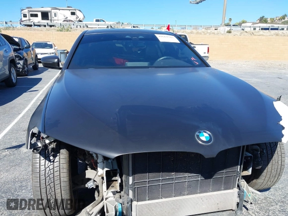 2020 BMW 5 Series 530e with VIN WBAJA9C02LCD31800, listed as a IAAI auction lot 41669765 with 99,024 mi miles and . Bid and sale history available at DreamBid. Image 13.