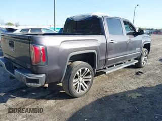 2016 GMC Sierra 1500 SLT with VIN 3GTU2NEC5GG291712, listed as a IAAI auction lot 41924266 with 135,005 mi miles and . Bid and sale history available at DreamBid. Image 4.