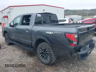 2021 Nissan Titan Pro-4X with VIN 1N6AA1ED3MN531332, listed as a IAAI auction lot 41918065 with 125,323 mi miles and . Bid and sale history available at DreamBid. Image 6.