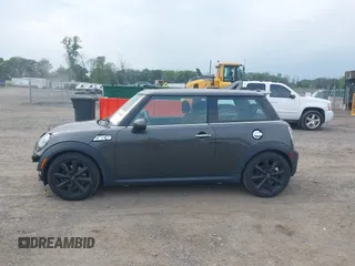 2011 MINI Hardtop S with VIN WMWSV3C58BTY13412, listed as a IAAI auction lot 42516587 with 124,831 mi miles and . Bid and sale history available at DreamBid. Image 15.