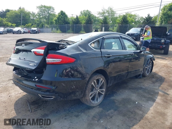 2019 Ford Fusion Titanium with VIN 3FA6P0D92KR247270, listed as a IAAI auction lot 42474803 with Not provided miles and . Bid and sale history available at DreamBid. Image 4.
