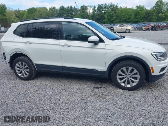 2018 Volkswagen Tiguan S с VIN 3VV1B7AX6JM052719, выставлен на аукционе IAAI как лот 42376937 с пробегом 91 429 миль миль и . История ставок и продаж доступна на DreamBid. Изображение 14.