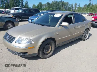 2002 Volkswagen Passat GLS z VIN WVWPD63B72P068163, wystawiony jako IAAI lot #42453059 z przebiegiem 200 318 mil mil oraz . Historia ofert i sprzedaży dostępna na DreamBid. Obrazek 2.