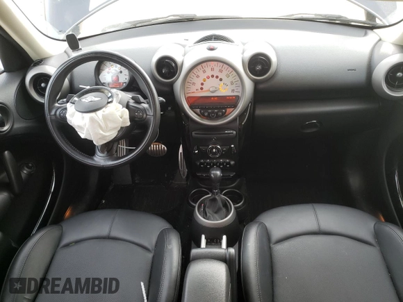 2012 MINI Countryman S with VIN WMWZC5C55CWL64092, listed as a Copart auction lot 50703855 with 69,785 mi miles and Salvage Title. Bid and sale history available at DreamBid. Image 8.